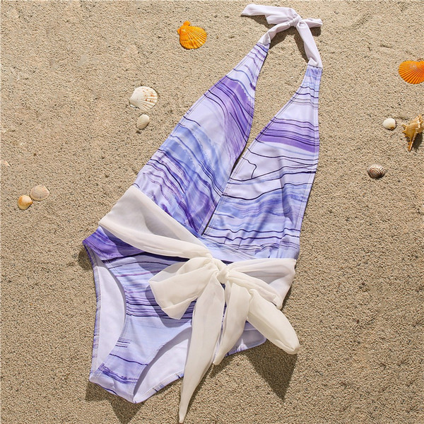 Ženski jednodijelni kupaći kostim s dubokim dekolteom i trakom