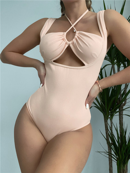 Ženski jednodijelni kupaći kostim s izrezima