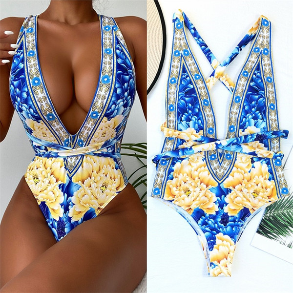 Modernus vientisas maudymosi kostiumėlis su gilia iškirpte ir raiščiais