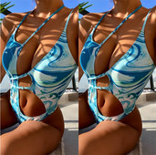 Ženski jednodijelni kupaći kostim s izrezima