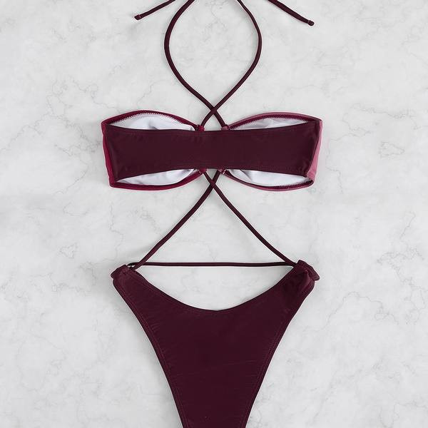 Ženski jednodijelni kupaći kostim s izrezima