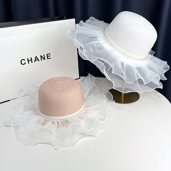 Ljetni ženski šešir s tilom