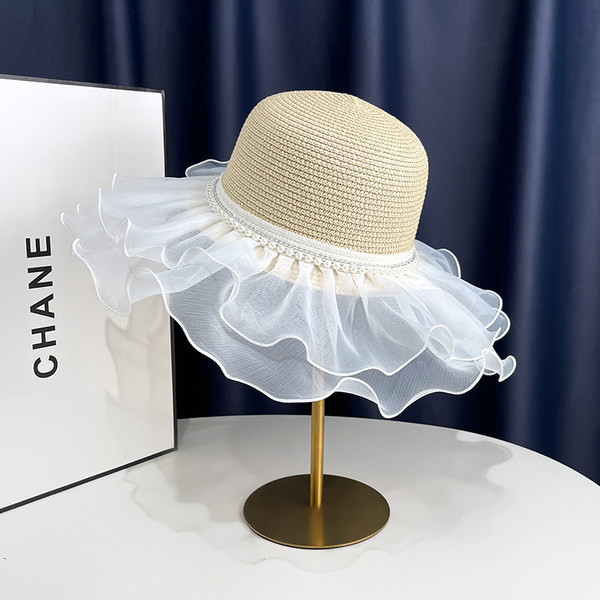 Ljetni ženski šešir s tilom