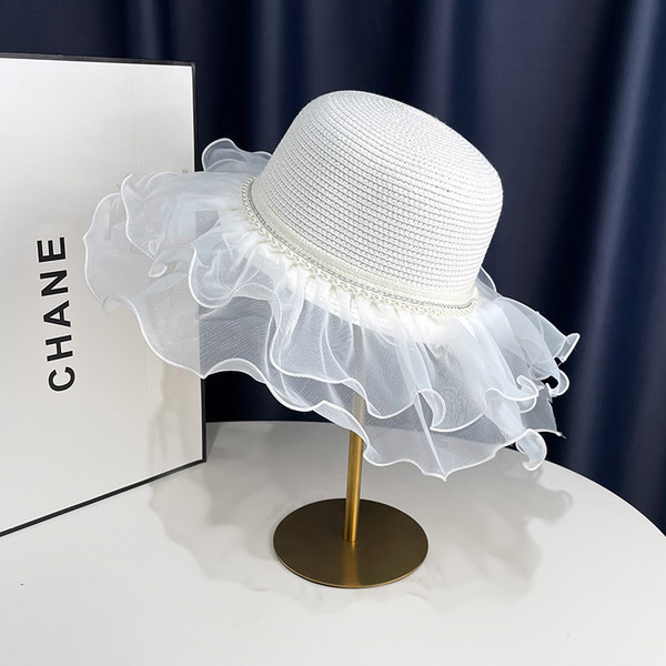 Ljetni ženski šešir s tilom