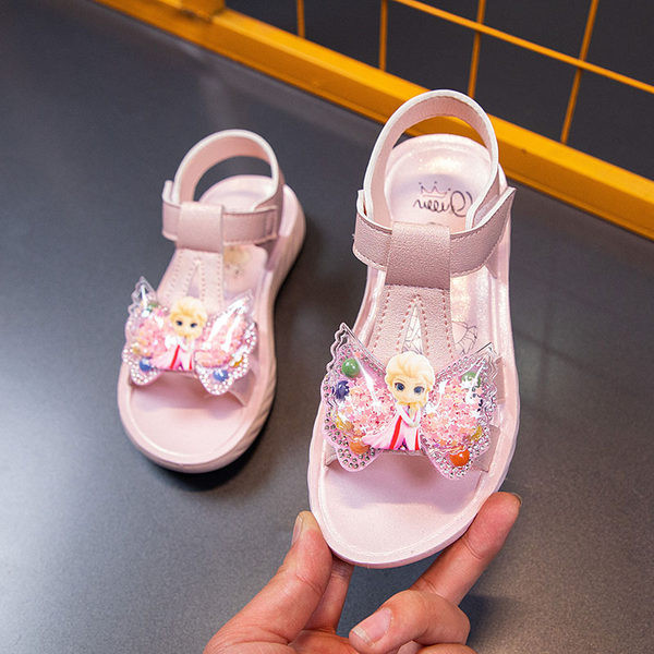 Tüdrukute sandaalid - paela ja animatsiooniga