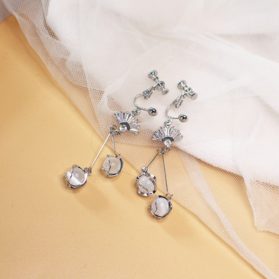 Női lógó fülbevaló díszkövekkel