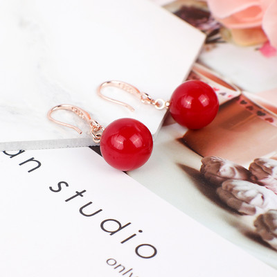 Női fülbevaló gyöngy medállal