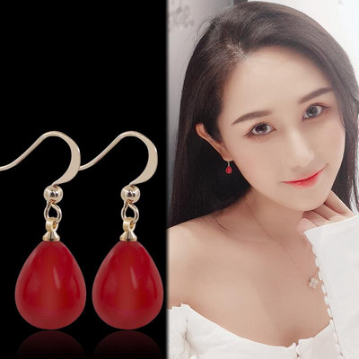 Női fülbevaló gyöngy medállal