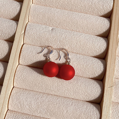 Női fülbevaló gyöngy medállal