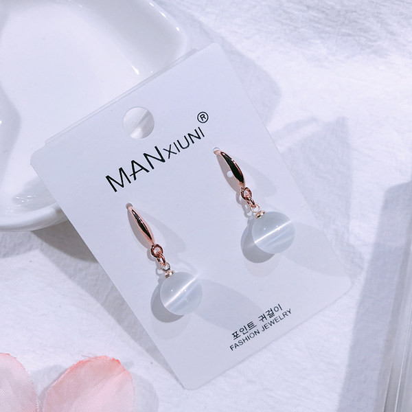 Női fülbevaló gyöngy medállal