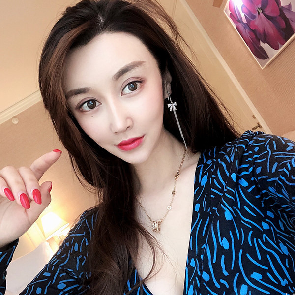 Női lógó fülbevaló - ötágú csillagokkal díszítve