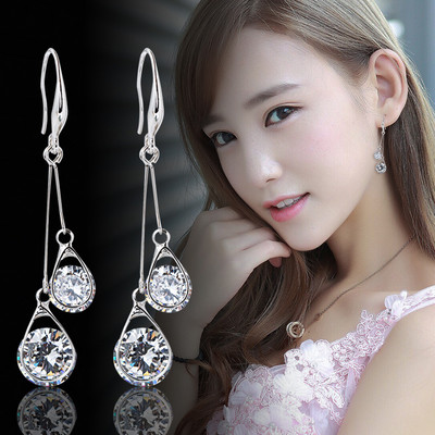 Női fülbevaló kövekkel