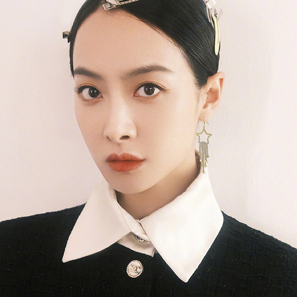 Női fülbevaló - csillag díszítéssel