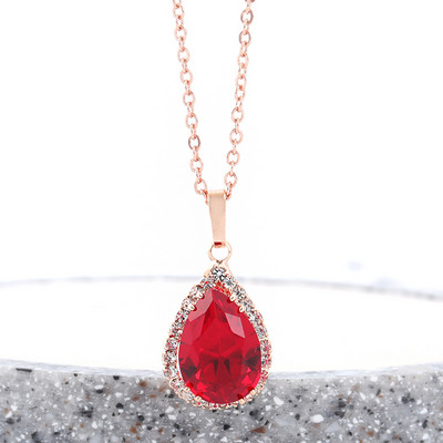 Női fülbevaló arany és ezüst színben, dekoratív színes kövekkel