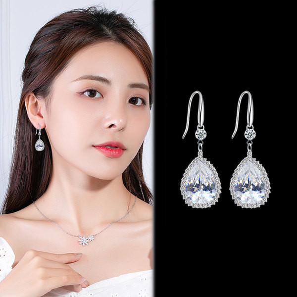 Női fülbevaló arany és ezüst színben, dekoratív színes kövekkel