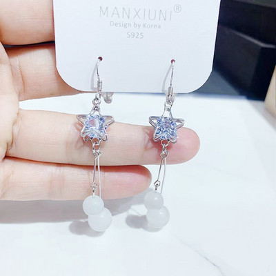 Női fülbevaló dekoratív matt gyöngyökkel és kövekkel