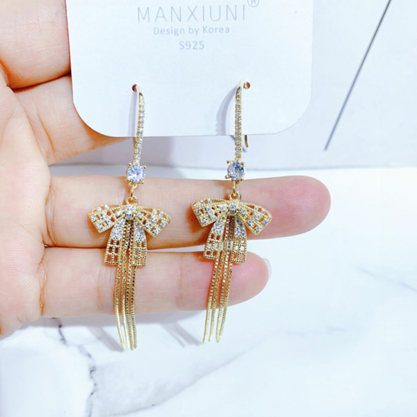 Hosszú, elegáns női fülbevaló ezüst és arany színben