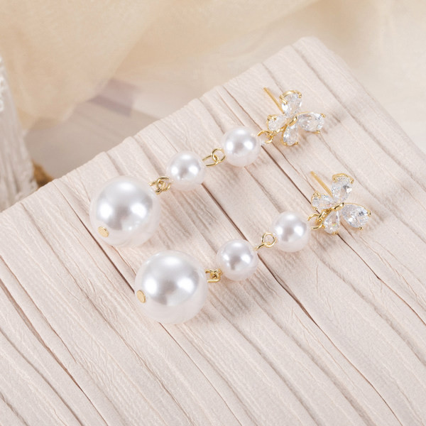 Női fülbevaló – pillangós gyöngy