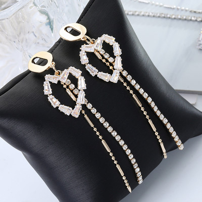 Női fülbevaló kövekkel - arany és ezüst színben