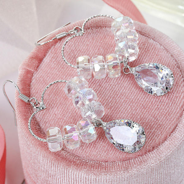 Női fülbevaló - csüngő szívecskével