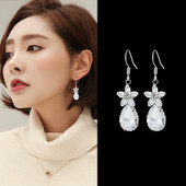 Női fülbevaló medállal - ezüst és arany színben