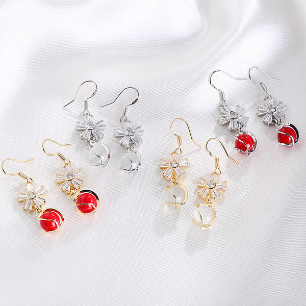 Női fülbevaló - gyöngy virággal