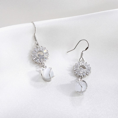 Elegáns női fülbevaló ezüst és arany színben