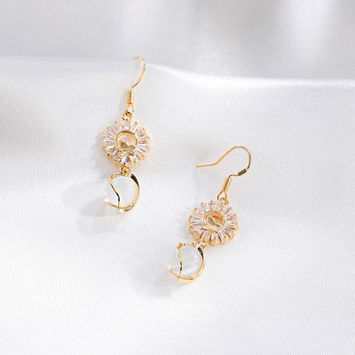 Elegáns női fülbevaló ezüst és arany színben