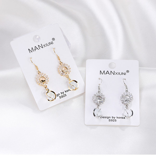 Elegáns női fülbevaló ezüst és arany színben