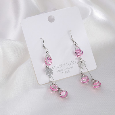 Női fülbevaló arany színű és dekoratív kristályokkal