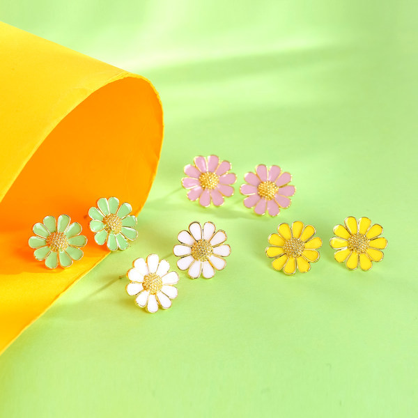 Μικρά γυναικεία σκουλαρίκια με διακοσμητικά λουλούδια